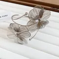 Macro view of intricate silver filigree flower detail on an elegant metal arm cuff - 5# Mesh Craft Flowers / Silver
