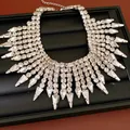 Detailed view of luxury rhinestone fringe choker necklace with sparkling teardrop stones - Silver