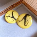 Round yellow resin stud earrings with black ink marbling pattern design - Round Stud Earrings