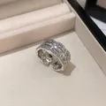 Close-up of luxury silver-tone open ring with sparkling zircon lace-edge design - Open (HR3414) / Silver