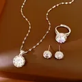 Elegant silver-tone jewelry set with round cubic zirconia necklace, ring and earrings - Necklace Earrings And Ring Set / Silver-White