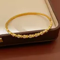 Detailed view of a gold stainless steel bangle inlaid with sparkling cubic zirconia - 3# Bracelet-Gold