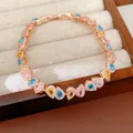 Detailed close-up of a premium rose gold bracelet with heart-shaped colorful zircons - Heart-Linked (2#) / Rose Gold-Colorful