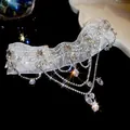 Macro close-up of a French retro lace choker necklace with sparkling crystal flower pendants - French Vintage Lace Flower Style (HN11918) / Silver