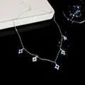 Close-up detail of a delicate silver necklace featuring five sparkling cubic zirconia star pendants - Five Stars Pendant Necklace-Silver