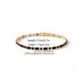 Nahaufnahme eines vergoldeten Armbands mit schwarzen Steinen und Maßangaben in Englisch. - 2.5*5+2.5mm Doppelter schwarzer Stein (XSL1693) / Gold