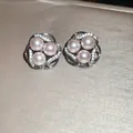 Close-up of elegant flower stud earrings with pink pearls and sparkling zircon - Pink Flower Cluster Style (8#) / Silver Pink