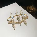 Nahaufnahme goldener Mehrfingerring mit Weizenähren-Design und Zirkonsteinen - Ährenform (HR3357) / Gold