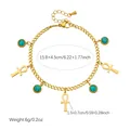 Detailed view of vintage gold plated stainless steel anklet with turquoise and Ankh charms - B2146