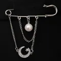 Close-up of a silver safety pin brooch with pearl and crystal moon star charms. - Star Moon Pearl with Chain (6443) / Silver