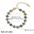 Detailed view of elegant gold-plated floral bracelet featuring sparkling blue rhinestones - Flower Bracelet (NB-B1403) / 18K Gold / Gold