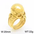 Close-up detail of a gothic gold stainless steel men's ring with a cracked skull - Size 9 / Gold