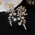 Detailed view of sparkling flower crystal dangle earrings for banquet elegance - Silver Needle / Gold-Clear