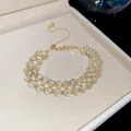 Hand-woven crystal hollow bracelet with adjustable slider in golden finish - 41# Bracelet / Gold-White