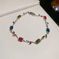 Detailed close-up of Monet Garden style vine bracelet with colorful zircons and silver finish. - Colorful Vine / Silver