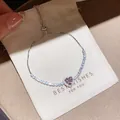 Vue détaillée d'un élégant bracelet bolo en zircon cœur rose sur une pochette cadeau - Cœur Pierre Principale Rose (5#) / Argent-Rose (5#)