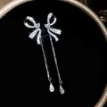 Exquisite sparkling silver bow-knot tassel drop earrings with shimmering zircon stones - Standard Style / Silver