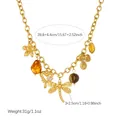 Detail view of a gold-plated vintage dragonfly necklace with clear size markings. - N4280