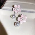 Close-up detail of elegant pink enamel flower earrings with zirconia and hanging white pearls - Gradient Cherry Blossom Style (9#) / Silver Pink