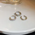 Detailed view of silver-toned zircon ear cuff set featuring minimalist metal designs - Three-Piece Set / Three-Piece Set / Silver