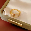 Detailed view of 18k gold plated ring featuring geometric hollow design with zircon - Geometric Hollow Style (HR3325) / Gold