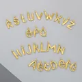 Set di 26 ciondoli con lettere in acciaio inossidabile dorato per gioielli DIY - Oro