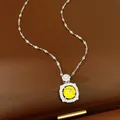 Macro detail of elegant square pendant with a sparkling yellow round zircon stone - Yellow Main Stone (HN11761)