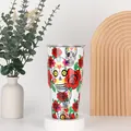 Detailed view of 30oz tumbler with colorful sugar skull and red rose floral design - 30oz
