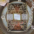 Golden laser-cut wedding invitation with floral belly band and shimmering glitter finish - Glitter Rose Gold