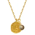 Dettaglio della collana zodiaco in oro 18k con ciondolo rotondo e gemma incastonata - Pesci