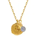 Detailed macro view of 18k gold paperclip chain with Aries coin and blue gemstone - Aries