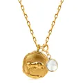 Detail of 18k gold plated Taurus pendant with translucent gemstone on link chain - Taurus