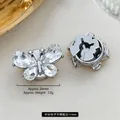 Detailed view of silver butterfly rhinestone lapel pin showing front and back with dimensions - 24mm