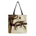Detail of cute cat print on eco-friendly canvas tote bag with black shoulder straps - Cat Sleeping on Tree Branch