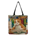 Reusable white canvas tote bag with cute orange cat reading print and black straps - Hm2537