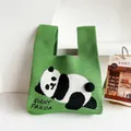 Green knitted panda tote bag with a 3D plush tail and GIANT PANDA text decoration - Green - Looking Up Panda