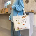 White canvas tote bag featuring autumn harvest hedgehog and mushroom print for women - Autumn Leaves / White