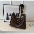 Retro minimalist large capacity dark brown crossbody bag with soft textured leather and silver buckle - Brown