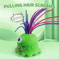 Jouet monstre vert aux cheveux colorés qui crie et fait des sons quand on tire - Vert