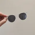 Kids round sunglasses with transparent frame and dark gray lenses for UV protection - Clear Frame Black Lens