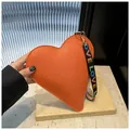 Orange heart-shaped handbag with litchi texture and LOVE lettered woven strap - Orange