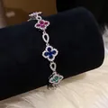 Bracelet trèfle en argent serti de zircons multicolores sur un support noir chic - Trèfle Géométrique en Strass Multicolore (50#) / Argent-Multicolore (50#)