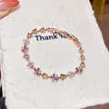 Bracelet exquis en or rose orné de fleurs en zircon violet et de perles blanches - Strass Violet avec Perle Artificielle / Or Rose-Fleur Violette (1#)