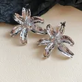 Exquisite large silver flower stud earrings with a textured metallic hammered finish - Silver Large Hammered Texture Flower (18#)