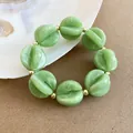 Pulsera bohemia verde fruta de acrílico con cuentas de mármol ovaladas y bolas de oro - Pulsera / Verde