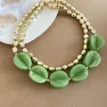 Collar bohemio de doble capa estilo resort con cuentas de acrílico verde y cuentas doradas - Collar / Verde