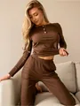 Close-up of coffee brown ribbed knit lounge set featuring white buttons and texture - S / Top And Bottom / Dark Brown