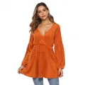 Detail of orange V-neck knit dress with plush texture, lantern sleeves and waist tie - S / Orange