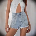 Light blue denim shorts featuring silver rhinestone tassels and frayed hems for women - Light Blue