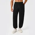 Men's breathable black yoga joggers with drawstring waist and ribbed cuffs for training - S / Black